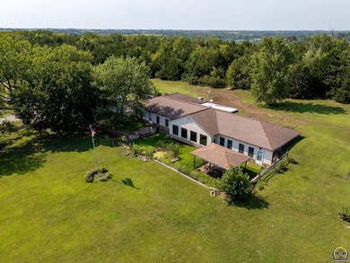 Discover the possibilities with this 3 bedroom, 2.5 bath berm