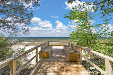 687' feet of pristine private sandy beach on Lake Michigan with - photo 14