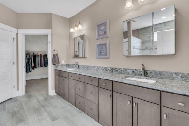 Pristinely-kept Tangerly Oak home featuring 3 bedrooms, 3 full