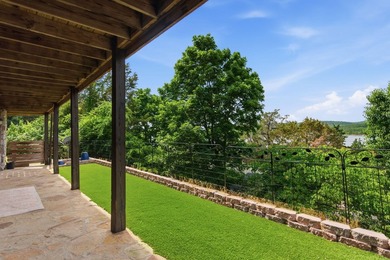 Hidden behind private gates overlooking Table Rock Lake lies an - photo 60
