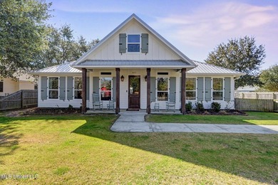 Modern farmhouse elegance meets Gulf Coast living. Step into one - photo 1