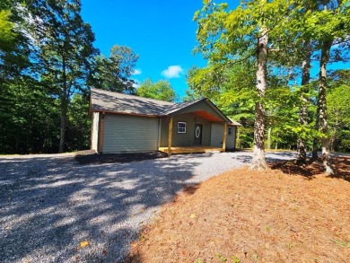 JUST REDUCED! Welcome home on this Brand-New 2BR/2BA Cabin