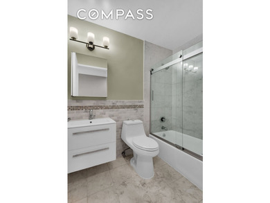 Sleek downtown style meets timeless Upper West Side living in - photo 10