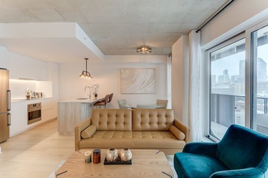 Vivez au bord du canal de Lachine dans ce condo construit en - photo 2