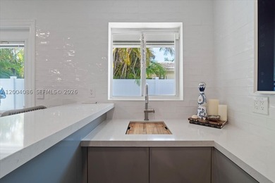 Beautifully updated home in the prestigious Coral Ridge Country - photo 12