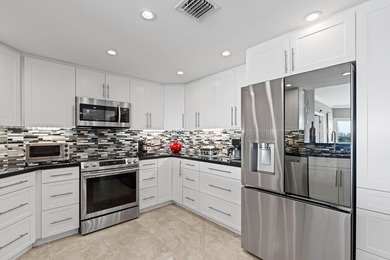 ABSOLUTELY GORGEOUS WATERFRONT CONDO | BREATHTAKING INTRACOASTAL - photo 8