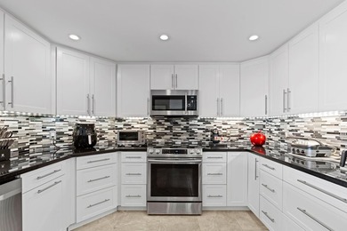 ABSOLUTELY GORGEOUS WATERFRONT CONDO | BREATHTAKING INTRACOASTAL - photo 9
