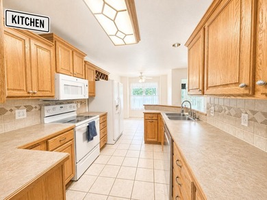 Enjoy lake life in this beautiful 4-bedroom, 3 bath home with a - photo 12