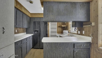 Waterfront Living with Endless Potential! Situated on navigable - photo 20