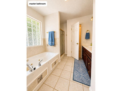 Enjoy lake life in this beautiful 4-bedroom, 3 bath home with a - photo 24