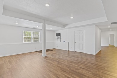 Enjoy lake life in this beautiful 4-bedroom, 3 bath home with a - photo 37