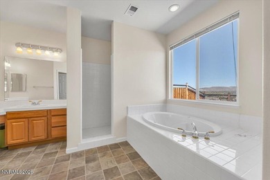 4 bed, 2.5 bath with the primary suite on the main level. Clean - photo 12