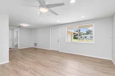 Virtually Staged. Welcome to this updated 2-bedroom, 2-bath home - photo 3