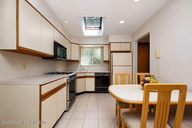 THIS TWO FAMILY HI-RANCH OFFERS A 3 BEDROOM MASTER PLUS A ONE - photo 12
