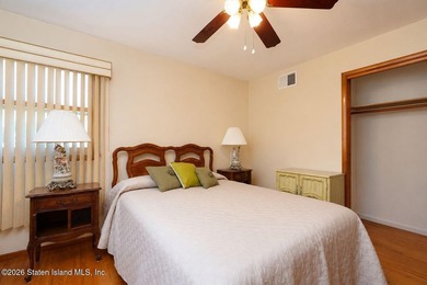 THIS TWO FAMILY HI-RANCH OFFERS A 3 BEDROOM MASTER PLUS A ONE - photo 14
