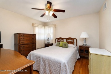 THIS TWO FAMILY HI-RANCH OFFERS A 3 BEDROOM MASTER PLUS A ONE - photo 15
