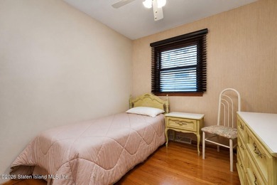THIS TWO FAMILY HI-RANCH OFFERS A 3 BEDROOM MASTER PLUS A ONE - photo 16