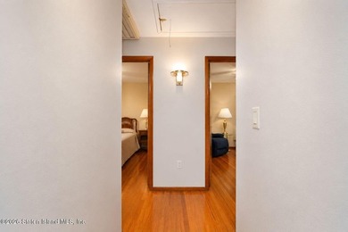 THIS TWO FAMILY HI-RANCH OFFERS A 3 BEDROOM MASTER PLUS A ONE - photo 19
