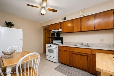 THIS TWO FAMILY HI-RANCH OFFERS A 3 BEDROOM MASTER PLUS A ONE - photo 21