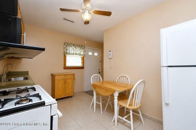 THIS TWO FAMILY HI-RANCH OFFERS A 3 BEDROOM MASTER PLUS A ONE - photo 22