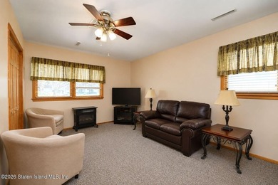 THIS TWO FAMILY HI-RANCH OFFERS A 3 BEDROOM MASTER PLUS A ONE - photo 25