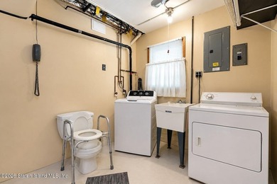 THIS TWO FAMILY HI-RANCH OFFERS A 3 BEDROOM MASTER PLUS A ONE - photo 29