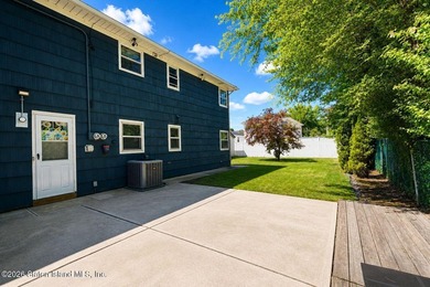 THIS TWO FAMILY HI-RANCH OFFERS A 3 BEDROOM MASTER PLUS A ONE - photo 32