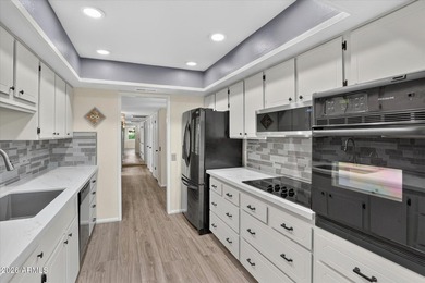 GOLF COURSE GEM! Beautifully updated 2-bedroom, 2-bath Gemini - photo 1