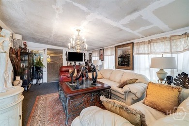 This 1950s ranch bungalow offers four bedrooms and two full - photo 5