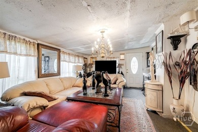 This 1950s ranch bungalow offers four bedrooms and two full - photo 6