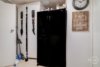 This 1950s ranch bungalow offers four bedrooms and two full - photo 9