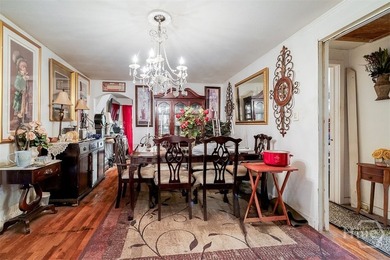 This 1950s ranch bungalow offers four bedrooms and two full - photo 10