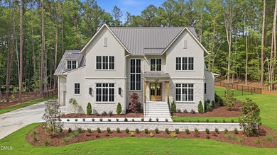 Exceptional custom residence by Raleigh Custom Homes, situated - photo 2