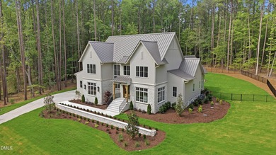Exceptional custom residence by Raleigh Custom Homes, situated - photo 3