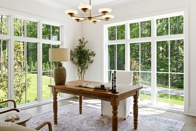 Exceptional custom residence by Raleigh Custom Homes, situated - photo 10