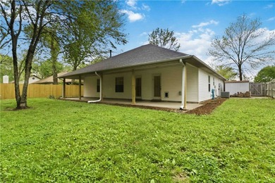 Welcome to this well-maintained 3-bedroom, 2-bath home in a - photo 3