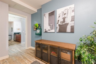 This modern end unit on the 4th floor of Skypoint in downtown - photo 3