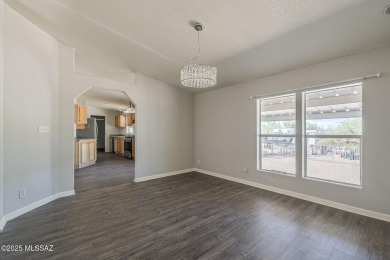 Beautiful manufactured home on an acre lot with manicured