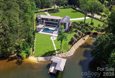 Private by design. Defined by the lake. Behind private gates and - photo 3