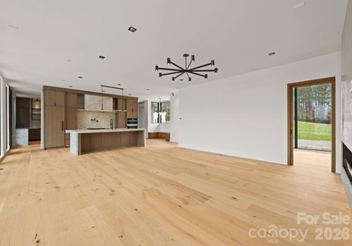 Private by design. Defined by the lake. Behind private gates and - photo 7