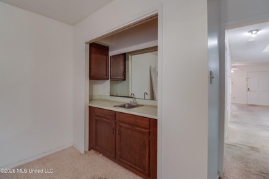 Located within the gated Colony Park Condominium community, this - photo 8