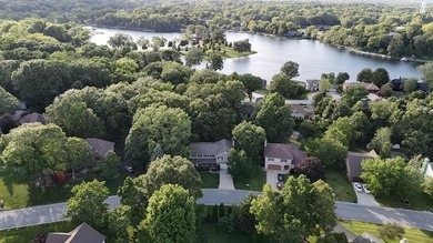 Nestled on a private 1/2 acre wooded lot in the desirable - photo 2