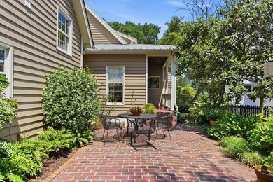 Located beneath breathtaking live oaks in the heart of the - photo 39
