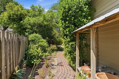 Located beneath breathtaking live oaks in the heart of the - photo 40