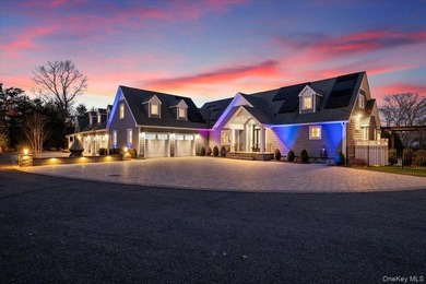 Set beyond a gated driveway and surrounded by mature landscaping - photo 1