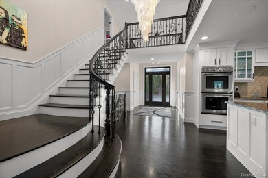 Set beyond a gated driveway and surrounded by mature landscaping - photo 6