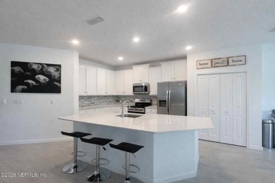 This 4-bedroom, 2-bath home features a spacious open layout - photo 6
