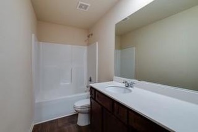 Discover this beautifully maintained four-bedroom, 2.5-bathroom - photo 11