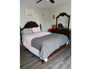 Centrally located large townhome with tile on 1st floor, wood on - photo 16