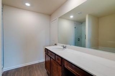 Discover this beautifully maintained four-bedroom, 2.5-bathroom - photo 17